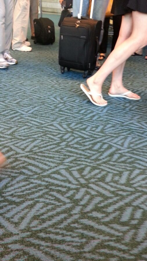 Free porn pics of Airport teen candid feet 4 of 5 pics