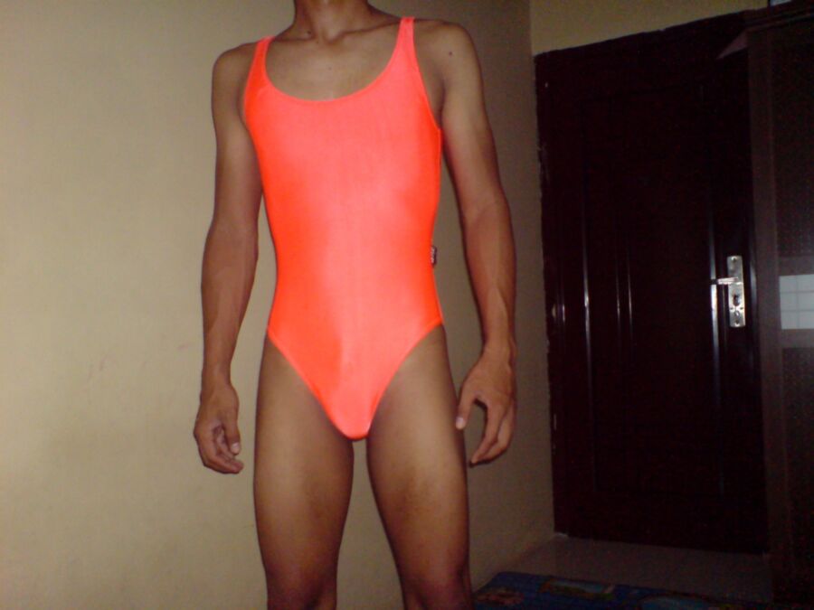 Free porn pics of Orange Swimsuit 1 of 8 pics
