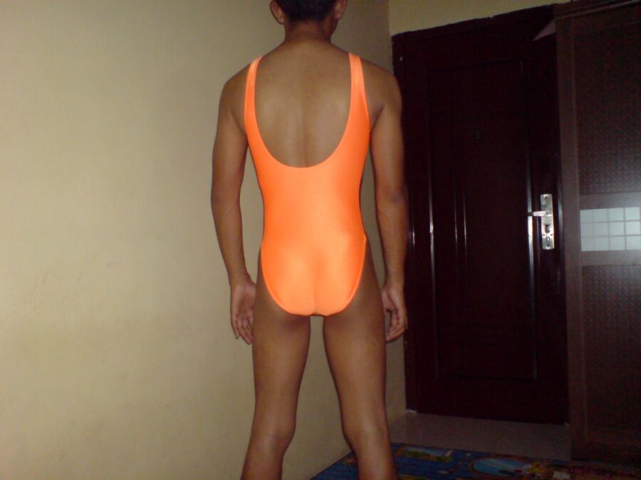 Free porn pics of Orange Swimsuit 6 of 8 pics