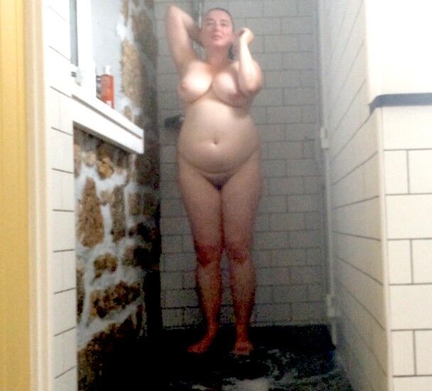 Free porn pics of Super curvy wife spied naked in the shower (The Good Wife) 22 of 27 pics